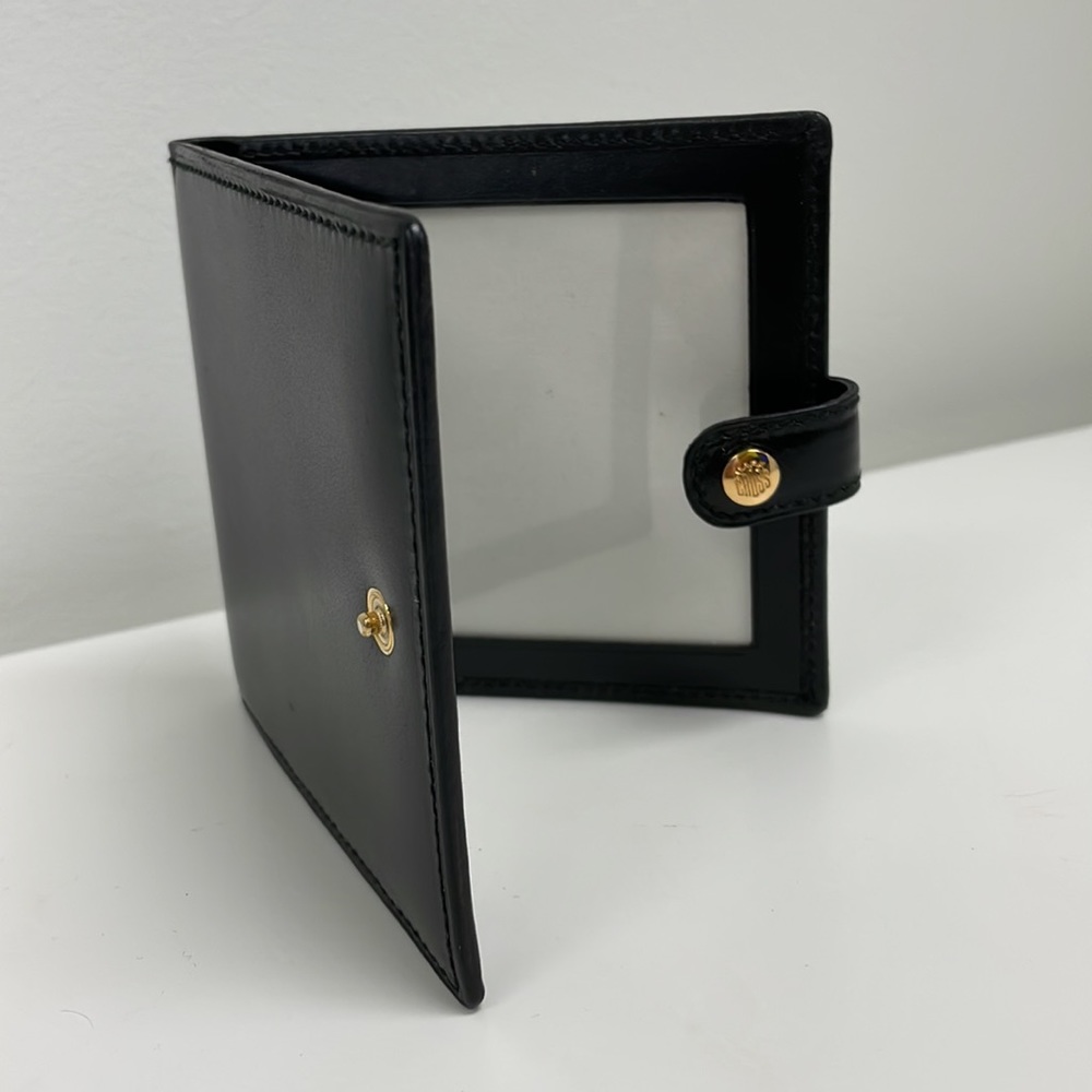 Mark Cross black grain leather folding snap fold travel picture frame. Perf.